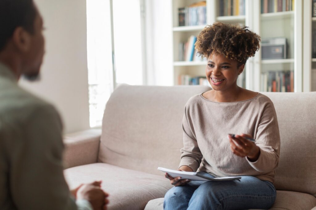 A man shares his expereince with his therapist during outpatient rehab in Nashville.
