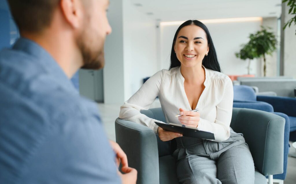 Man receiving guidance from therapist at PHP in Nashville.