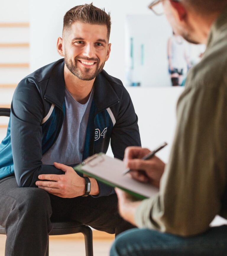 Man in session with therapist receiving trauma informed care in Nashville.