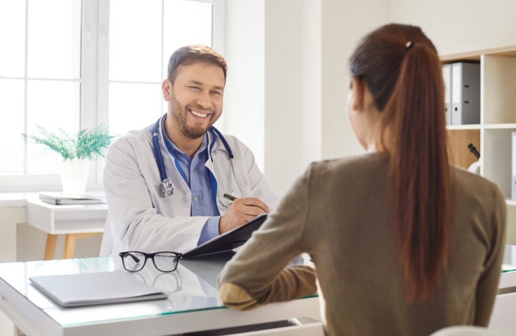 A woman discusses adderall addiction treatment in Nashville with her doctor.