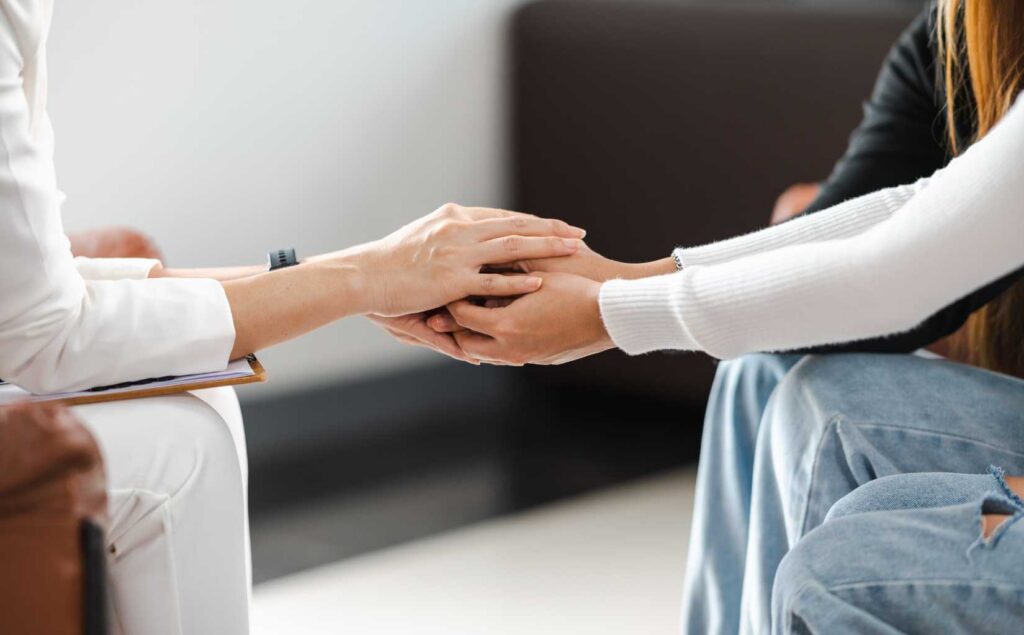 Psychologist providing emotional support at a young adults rehab in Nashville.