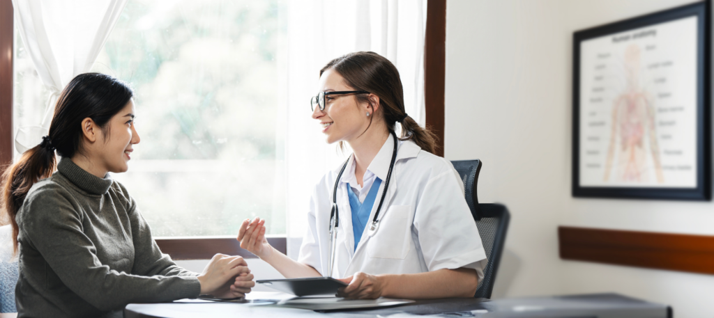 A woman discusses treatment options with her doctor during rehab in Memphis, TN.