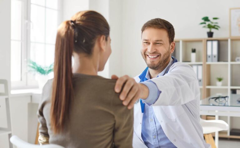 Positive doctor supporting client during synthetic drug addiction treatment in Nashville.