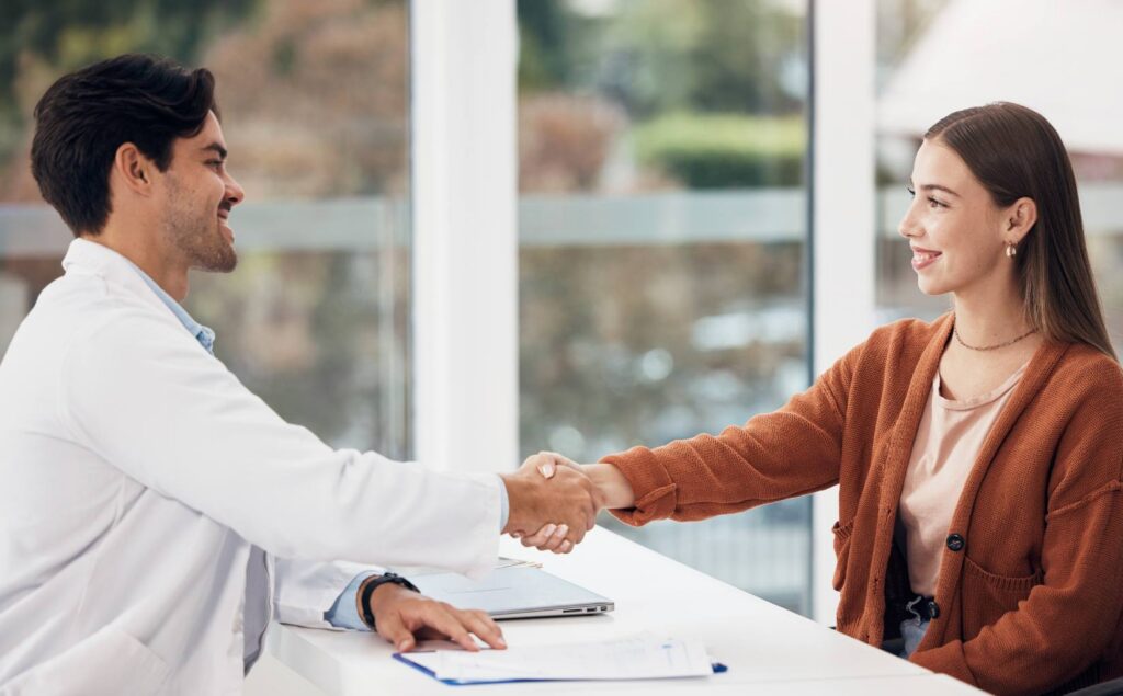 Woman receiving guidance during aftercare coordination in Nashville.