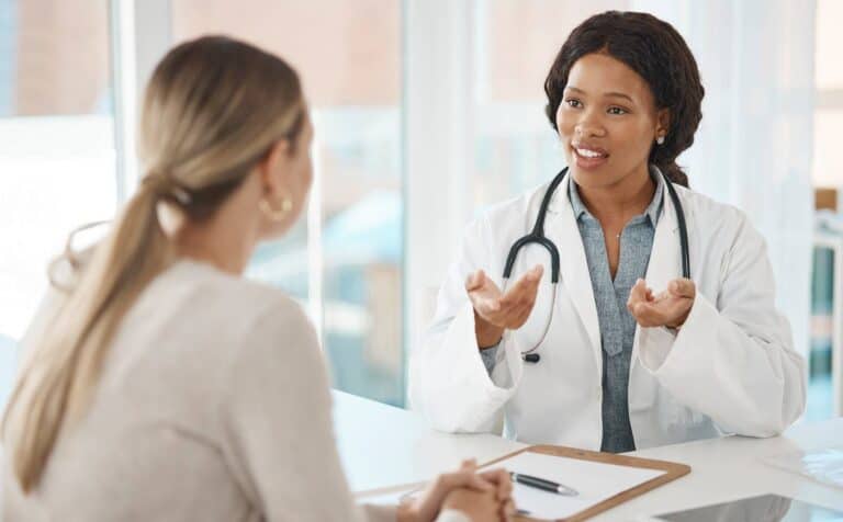 Medical professional offering guidance during hallucinogen addiction treatment in Nashville.