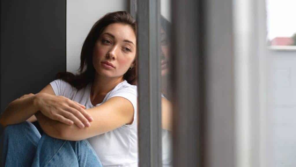 Woman looking discouraged during MDMA addiction treatment in Nashville recovery journey
