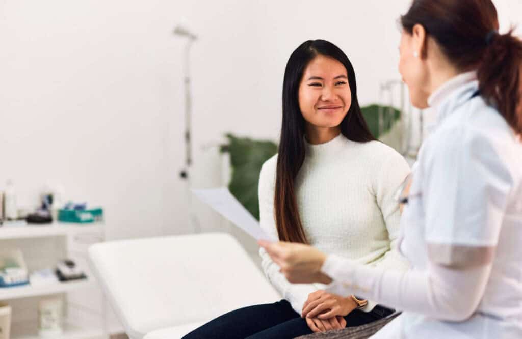 Woman speaking with doctor during MDMA addiction treatment in Nashville consultation