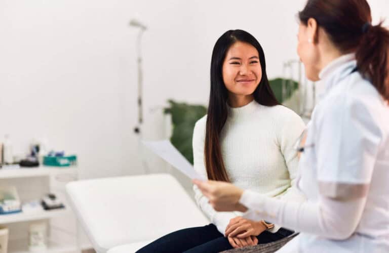 Woman speaking with doctor during MDMA addiction treatment in Nashville consultation
