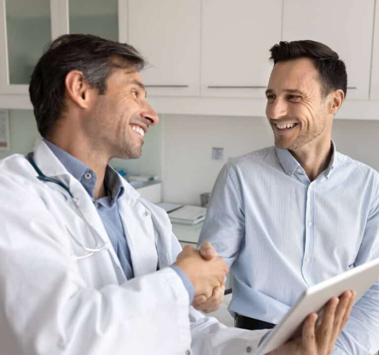 Doctor providing guidance and support to a man seeking help for oxycodone addiction.